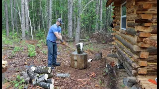 Forest kitchen floor, splitting wood and a day on the river at the off grid log cabin