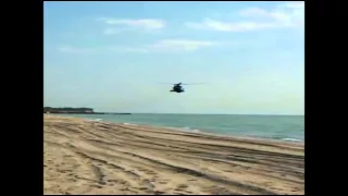 на вертолете на пляж