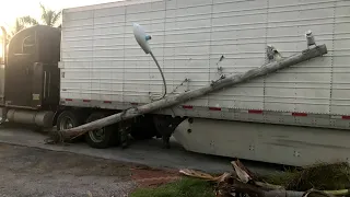 Semi-truck knocks down power lines in Pompano Beach neighborhood