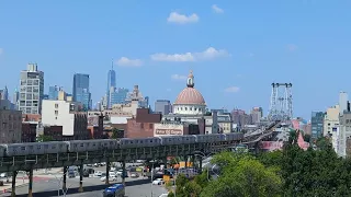 NYC Subway train heading toward Manhattan from Brooklyn using the Williamsburg Bridge