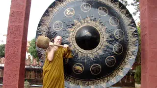 monk Kenneth with big Gong at Lumphun Thailand