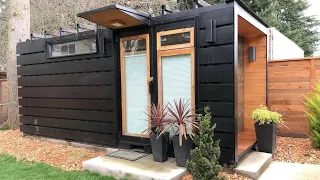 A 8' x 20' shipping container converted into a modern functional living space.