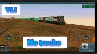 Locomotiva SD70E VLI Como helper do Trem rumo para vencer a rampa.