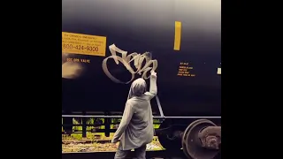 graffiti tagging in a train yard