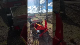 Hecht wood chipper in action