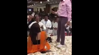 Rupees rain at a wedding in India.