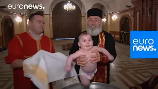 This baptism in Georgia is enough to make your head spin - Orthodox Religion | euronews 🇬🇧