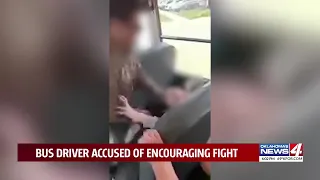 ‘Beat the hell out of him’: Oklahoma school bus driver caught on camera egging on fight between stud