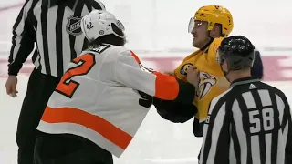 Tanner Jeannot fights Hayden Hodgson in center ice