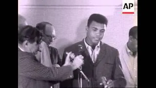 Cassius Clay Tells Newsmen How He Took Title From Sonny Liston (A)