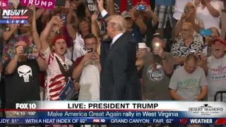 WATCH: President Trump Holds "Trump Loves Coal" Sign At West Virginia Rally (FNN)