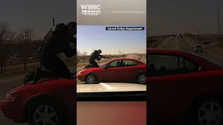 Police officer took a ride on the hood of a speeding car while attempting to stop a fleeing suspect