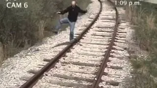 Drunk man plays on railway and gets hit by train!