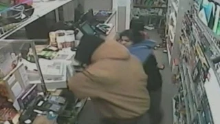 Store clerk fights off armed robbers