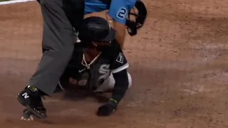 Luis Robert Slides into Tom Hallion