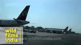 Kingfisher, Air India planes over the runway, Delhi Airport