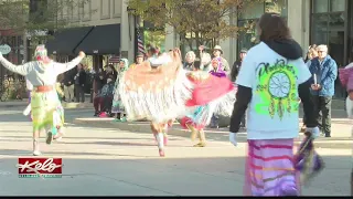Students take part in Native American Day parade