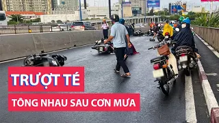 Xe máy trượt té, tông nhau trên cầu Sài Gòn sau cơn mưa giải nhiệt