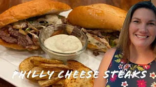 HOW TO MAKE RIBEYE PHILLY CHEESE STEAKS ON THE FLAT TOP GRIDDLE