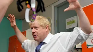 Boris Johnson tells Jeremy Corbyn to 'man up' over general election