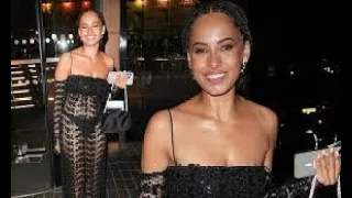 Smiling Amber Gill flashes her underwear in a see-through black jumpsuit as she leaves the BAFTA TV