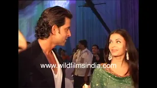 Hrithik Roshan and Aishwarya Rai are seen together at a party, coyly smiling at each other