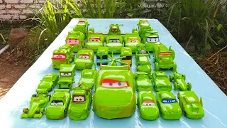 Clean up muddy minicar falling into the water & a convoys disney cars! Play in the garden