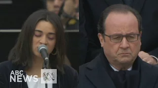 Singing and silence as France remembers victims of Paris attacks