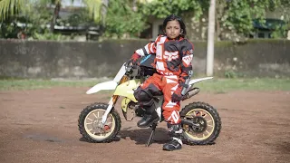 Kid on 50cc Dirt bike