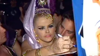 Throwback clip - Anna Nicole Smith dresses as a genie for DVD Launch Party in this clip from 2003