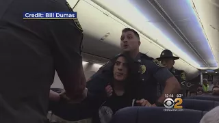 Woman Forcefully Removed From Flight