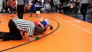 Taya wrestles a girl at Elida