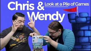 Chris and Wendy Look at a Pile of Small Box Card Games