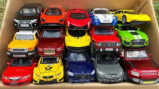 Box full of Lamborghini Venevo, Ferrari, Tank300, Pagani, Rolls Royce, Defender, GT500, Mazda.