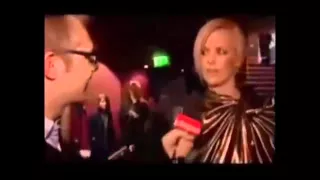 Charlize Theron speaking Afrikaans with Dutch speaking Belgian reporter