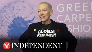 Annie Lennox wears 'Global feminist' shirt as she appears at Green Carpet Fashion Awards