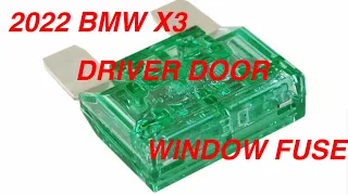 2022 BMW X3 drive door window fuse location.