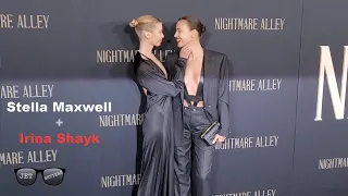 Stella Maxwell and Irina Shayk strike a pose on the red carpet at Nightmare Alley Premiere