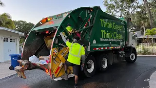 Waste Management Mack MRU CNG McNeilus Rear Loader Garbage Truck Packing Bags On Siesta Key