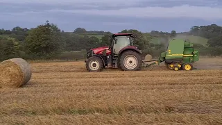 Maxxum 125 Baling Straw with John Deere 572 Baler