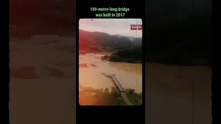 Dramatic Collapse: China's Bridge Submerged in 2017 Flood - Raw Footage