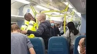 Shocking moment fist fight breaks out on packed London train ‘over passenger not wearing a face mask