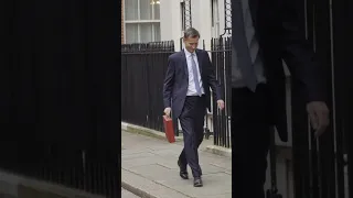 Chancellor Jeremy Hunt leaves Number 11 ahead of his Budget address to the House of Commons.