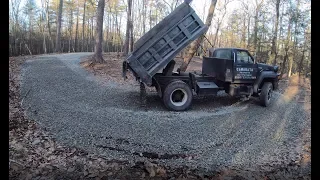 Delivering gravel to a muddy driveway