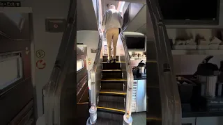 Dad climbing the steps to the Panorama car like a champ at 93