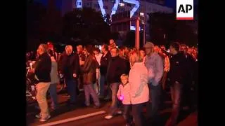 Candle vigil marks anniversary of protests that resulted in fall of Wall