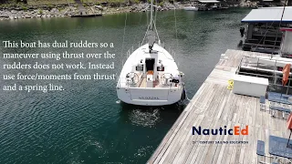 Docking a Sailboat with Dual Rudders in Reverse