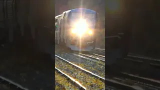 Fast Amtrak Train Blows The Leaves Off The Tracks