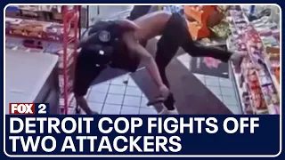 Uniformed Detroit officer jumped inside gas station, fights off two attackers