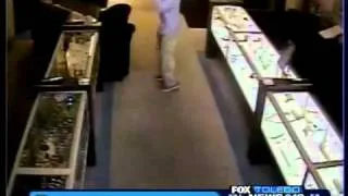 2 handcuffed, bound in Azure Jewelers robbery